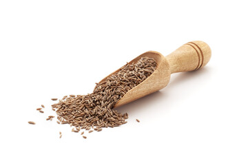 Front view of a wooden scoop filled with Organic Cumin Seeds (Cuminum cyminum) or jeera. Isolated...