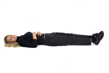 woman lying on the floor and looking at camera on white background - 779572089