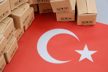 Turkish export concept. Flag of Turkey and many carton boxes.	