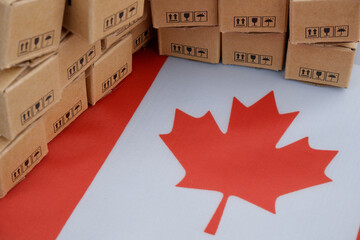 Canadian export concept. Flag of Canada and many carton boxes.