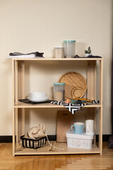 Fototapeta na wymiar Modern kitchen wooden shelf and kitchenware
