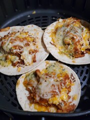 Closeup of taco. Traditional Mexican food with tortillas.