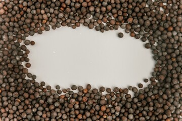 Brown Mustard Seeds Also Know as Rai Spice Background - obrazy, fototapety, plakaty