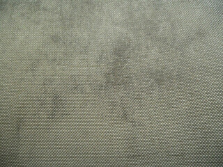 Texture of fabric of grey color for a background and a surface stains for background