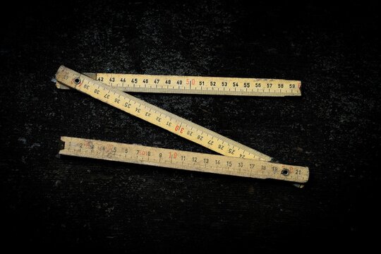 Top view of the zigzag folding rule isolated on the empty black background