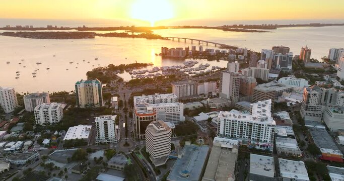 Sarasota, Florida city downtown at sunset with expensive waterfront high-rise buildings. Urban travel destination in the USA.