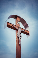 Wooden cross with a blue sky, religion concept