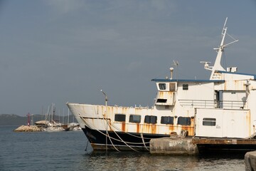 Naklejka premium Big rusty ship moored in the Adriatic Sea in Zadar, Croatia
