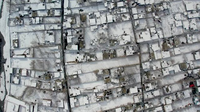 Top done view of congested snow covered Skardu city in Pakistan.