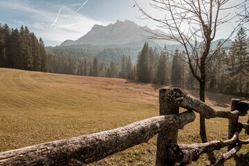 Beautiful shot of a rural valley near rocky mountains in Frakmuntegg, Switzerland
