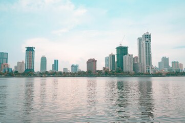 Calm waters of the sea with the buildings of Manila City of the Philippines in the background