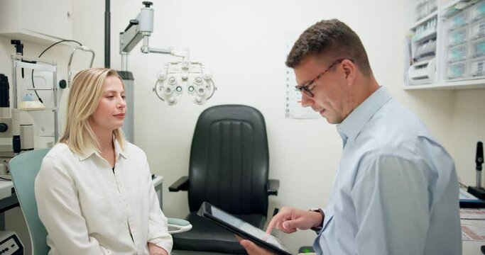 Optometry, doctor and consulting with tablet for patient, online information and digital records for eye test. Optometrist, client and technology for prescriptions, conversation and assessment.