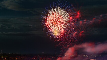 Beautiful shot of exploding colorful fireworks in a night sky