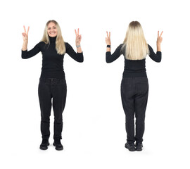 front and back view of the same woman with two fingers showing the victory sign white background - 779590880