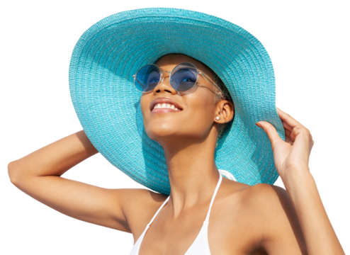 Smiling girl wearing a turquoise sun hat, blue sunglasses and bikini, African latin American woman isolated on white background. Concept of a seaside holiday or shopping for a summer beach holiday