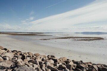Fototapeta na wymiar High-angle view of rocky Galway Ireland Salthill beach.