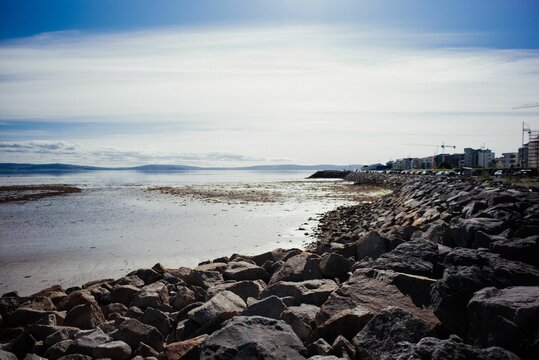 High-angle view of rocky Galway Ireland Salthill beach.