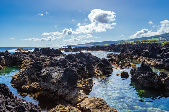 Volcanic rocks and clear water in the natural pools of Biscoitos, Terceira - Azores PORTUGAL