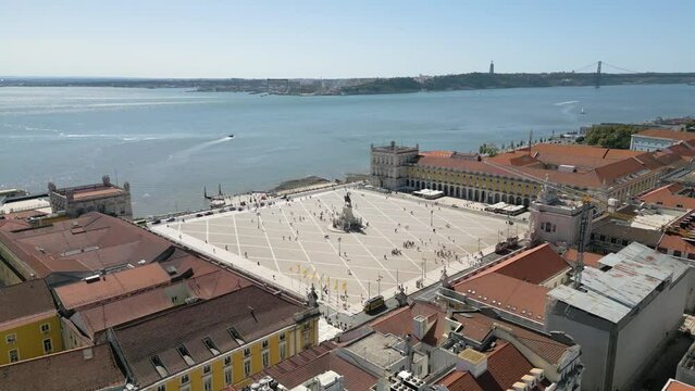 Aerial shot of the Terreiro do paco overlooking the coast of Lisbon in Portugal in 4K
