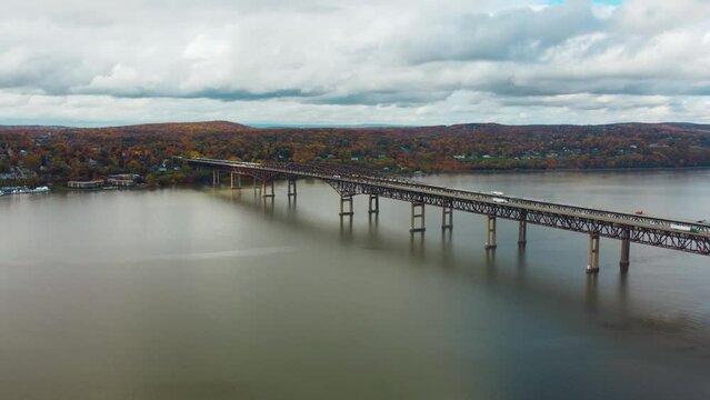 Bridge in New York with fall colors in background