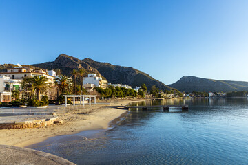 Early morning at Platja d'Albercutx in the bay of Port de Pollenca on Mallorca, Spain - obrazy, fototapety, plakaty