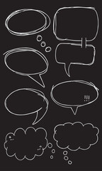 Collection of hand drawn speech bubble outlines. White line drawings on a black background.