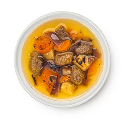 Foto op Plexiglas Beef stew with broth, soup with meat isolated on white background, top view © xamtiw