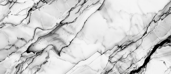 A closeup of a black and white marble texture resembling a snowy landscape. The pattern is reminiscent of monochrome photography, with a freezing, monochrome feel - obrazy, fototapety, plakaty