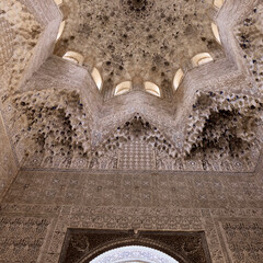 Rich decorations in Arabic style in the Royal Nazaries Palace in Alhambra, Granada, Andalusia, Spain