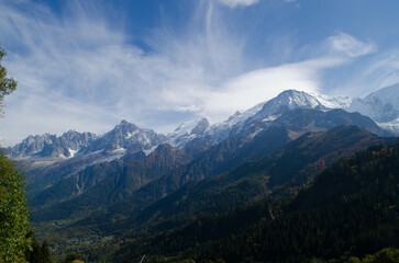 The alps mountains in the clouds