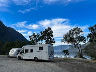 Foto op Plexiglas Motorhome camper in Flam city parking in south Norway. Europe © Alberto Gonzalez 