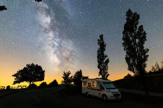 MIlky way and motorhome camper in Serra Del Cadi, Pyrenees, Spain