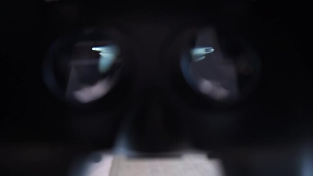 POV of a Person Picking Up, Putting On Virtual Reality Headset in Living Room 