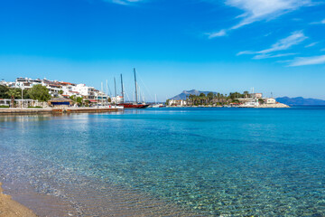 Aegean coastline holiday village in Turkey, Popular tourist resort turquoise sea and view of the harbor and city, Datca, Mugla province - obrazy, fototapety, plakaty