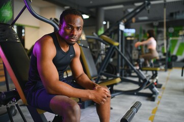 Fototapeta premium Black African American young man at the gym