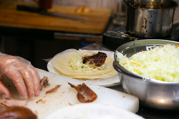 Crispy Peking duck cooked in the Chinese district of Nankinmachi in the city of Kobe in Japan.