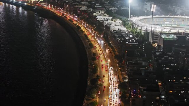Aerial view of Mumbai city at night. Drone shots of the most iconic of South Bombay, Marine Drive, also known as The Queen's Necklace. Shot of Mumbai Skyline, high-rise buildings in South Mumbai.