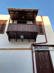  Historical building with balcony in small provincial town of Kas in Antalya province Turkey