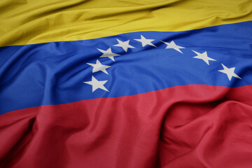 waving colorful national flag of venezuela.