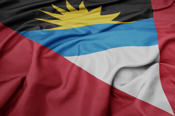 waving colorful national flag of antigua and barbuda.