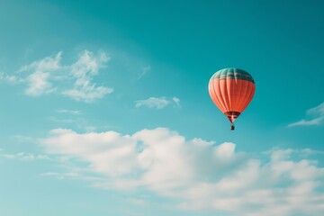 Obraz premium Hot Air Balloon Flying Through a Blue Sky, A plainly colored sky with a single hot air balloon floating, AI Generated