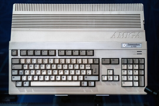 Warsaw, Poland - March 19, 2024. Commodore Amiga A-500 Computer on Blue