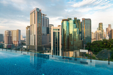 Kuala Lumpur cityscape, view from rooftop swimming pool,Kuala Lumpur,Malaysia.