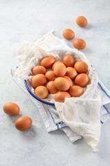Fresh organic eggs on kitchen table