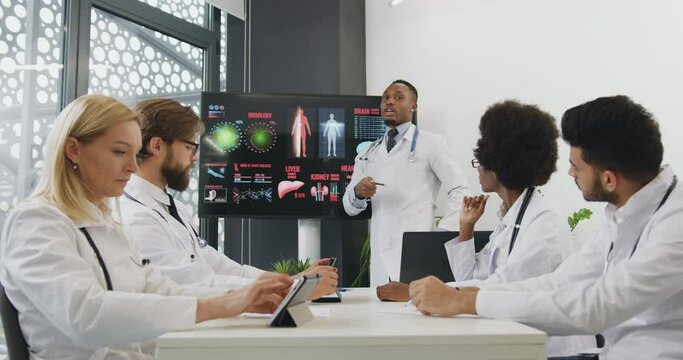 Head doctor explaining the internal structure of man's organs that can influencing on heart disease. Medical concept