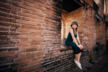 woman standing near wall