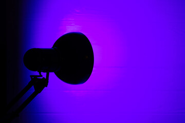 Violet neon bulb lighting. Modern lights for atmosphere at home or business working.