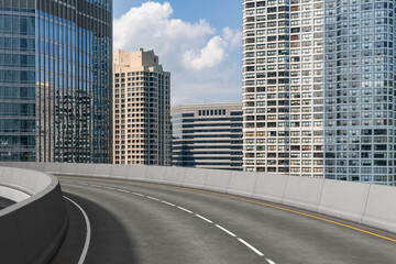 Fototapeta premium Empty urban asphalt road exterior with city buildings background. New modern highway concrete construction. Concept of way to success. Transportation logistic industry fast delivery. Chicago. USA.