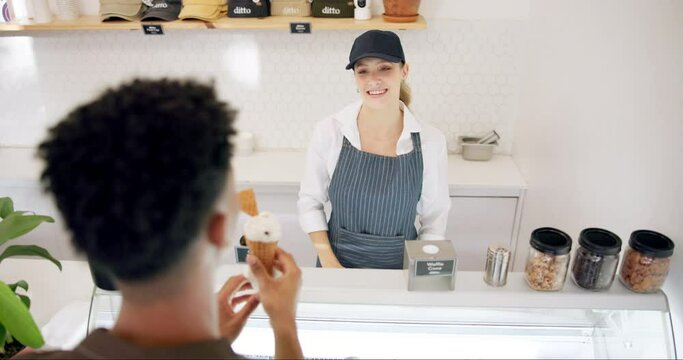 Customer, ice cream and shop seller with dessert or frozen food with happy cashier at counter. Woman, man and giving gelato cone, sweets and dairy sugar for service of employee with smile at store