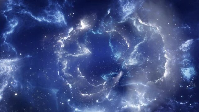 Expansive blue nebula complex highlighting the birthplace of stars, surrounded by cosmic dust and stellar clusters.